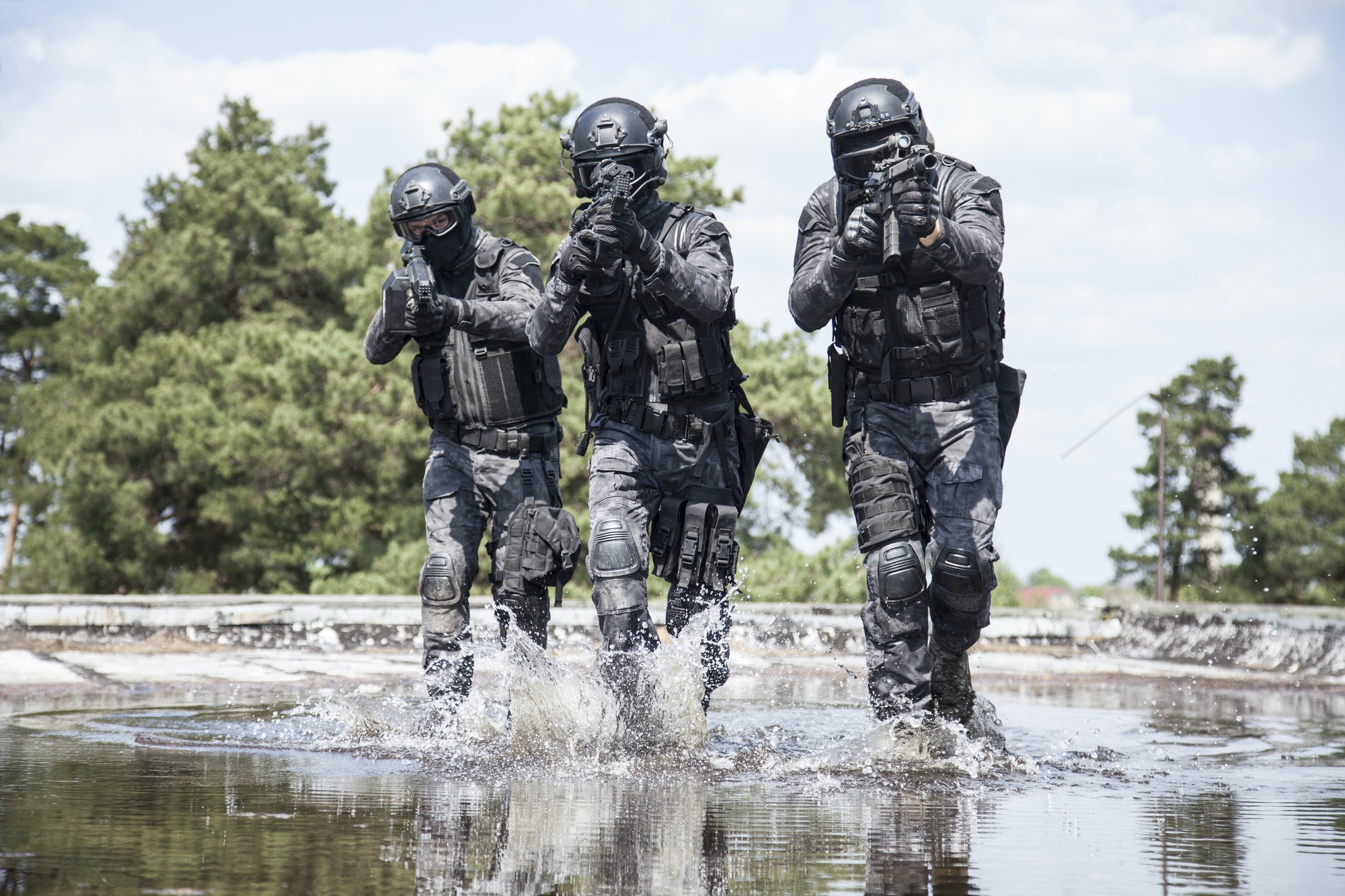 Spec ops police officers SWAT in the water
